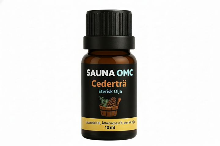 Cederträ eterisk olja med vit bakgrund